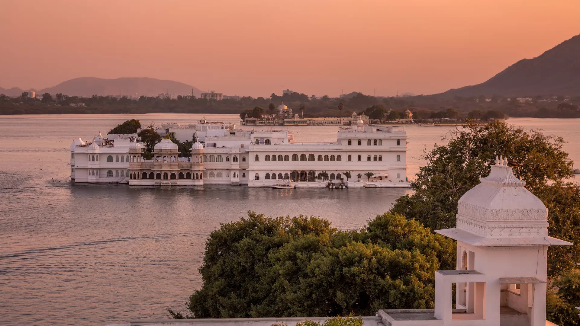 Lake Palace at sunset seen from a white palace cupola
