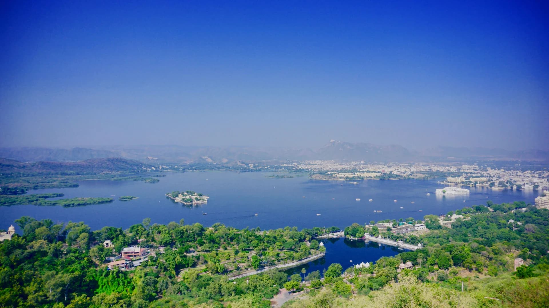 Panorama of Fateh Sagar Lake and its island garden from a hilltop