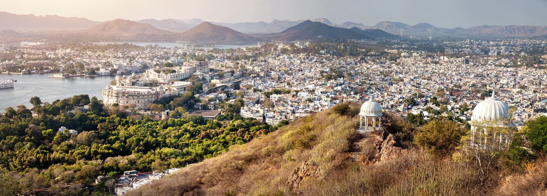 Panoramic view over Udaipur and its white domes from a hilltop